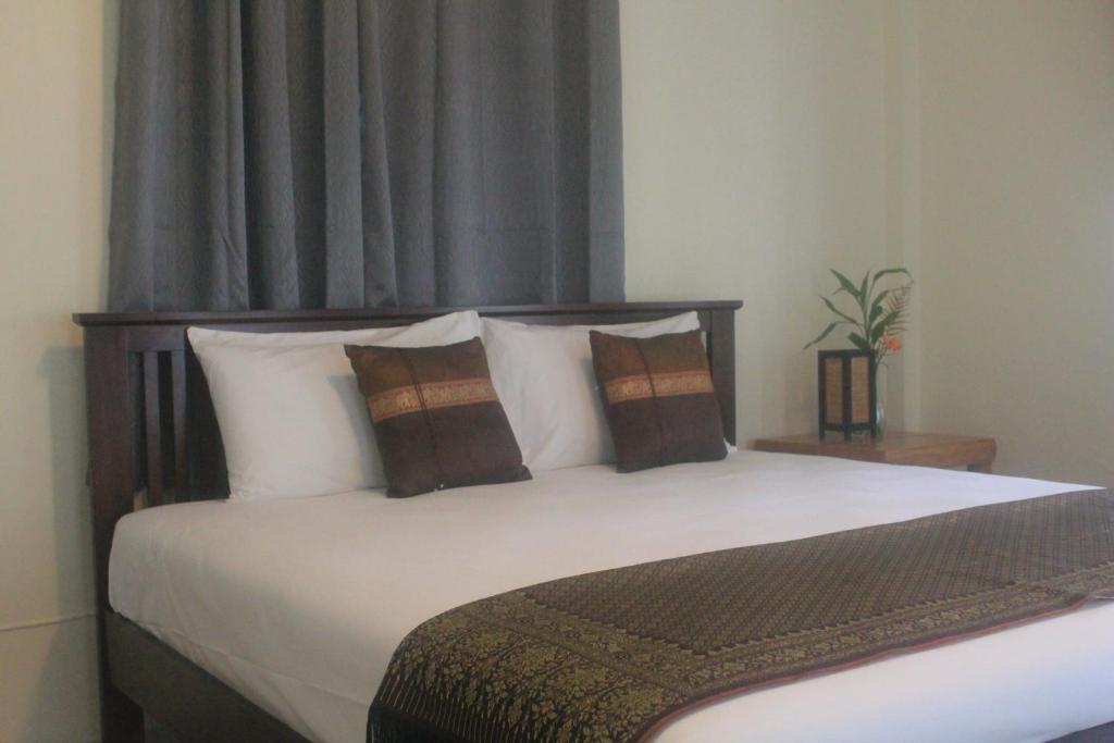 Postel nebo postele na pokoji v ubytování Privacy Resort - Koh Chang