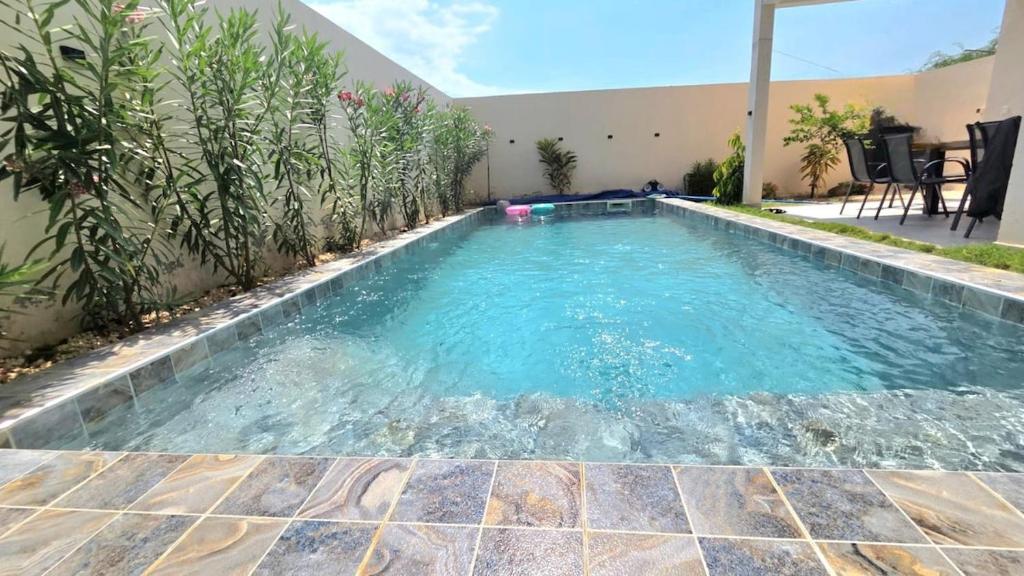 Bazén v ubytování Villa Toubab Dialaw nebo v jeho okolí