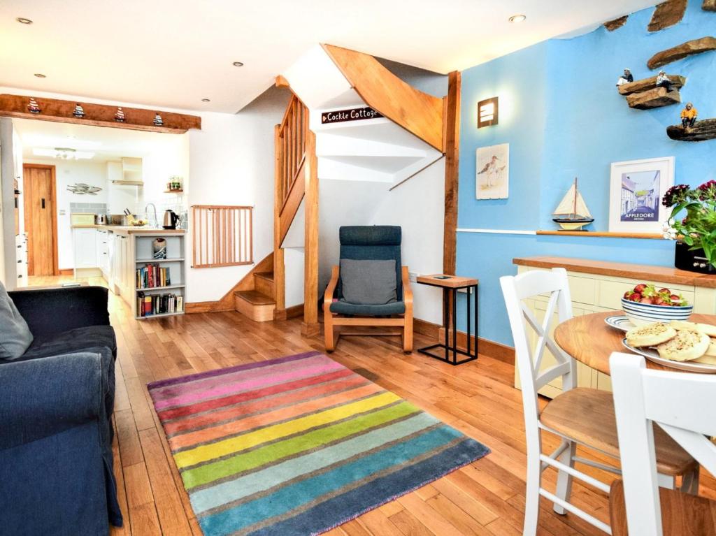a living room with a couch and a table at 2 bed property in Appledore Devon COCKL in Appledore