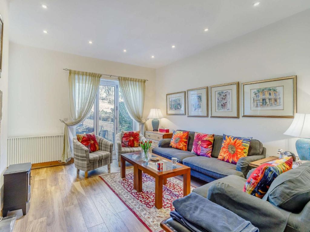 a living room with a couch and a table at 3 Bed in Rowlands Gill 86802 in Stanley