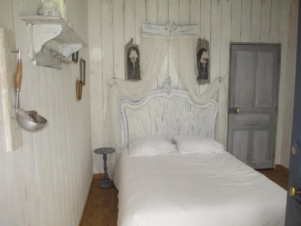Cama o camas de una habitación en La cabane de peau d'ane