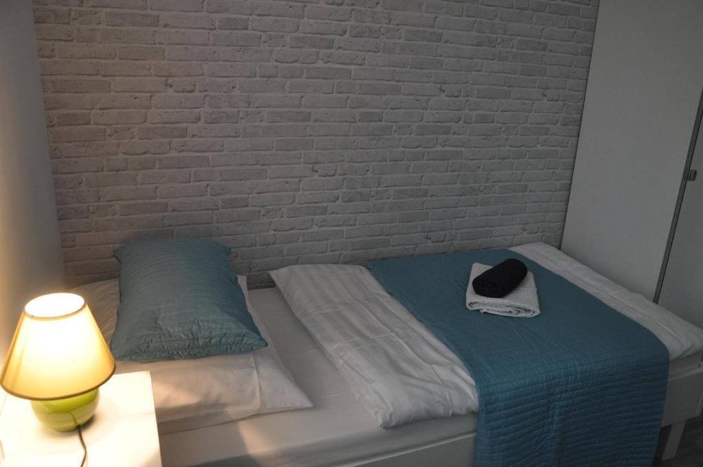 Postel nebo postele na pokoji v ubytování Isabella Rooms
