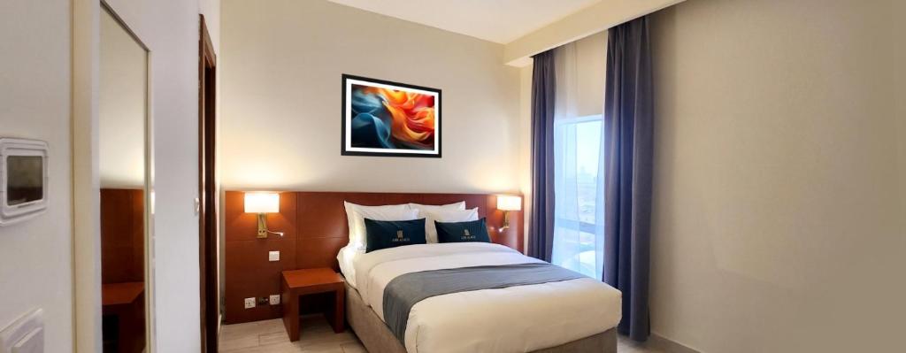 Postel nebo postele na pokoji v ubytování Acacia Hotel by BP Management