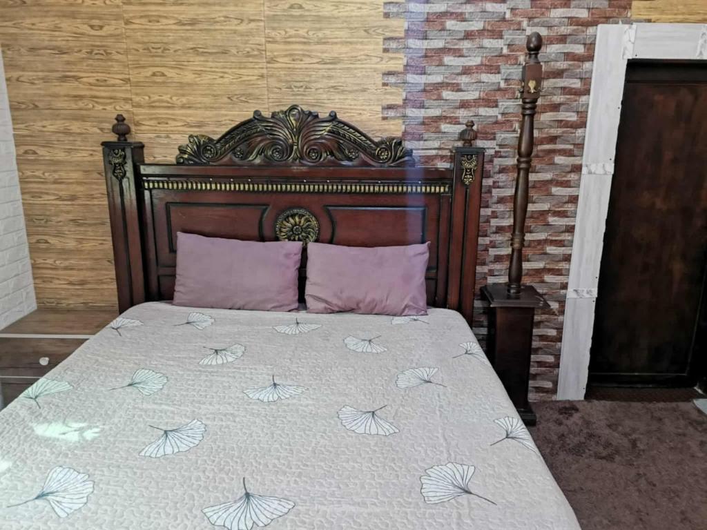 Ένα ή περισσότερα κρεβάτια σε δωμάτιο στο Flowar