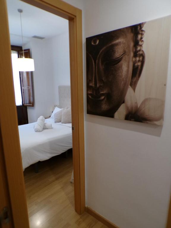 Postel nebo postele na pokoji v ubytování Santiago 30, 1A