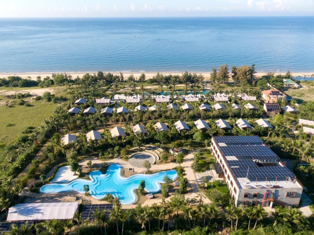 an aerial view of the resort with the ocean in the background at WoCAL Resort Ke Ga in Xóm Chum Găng