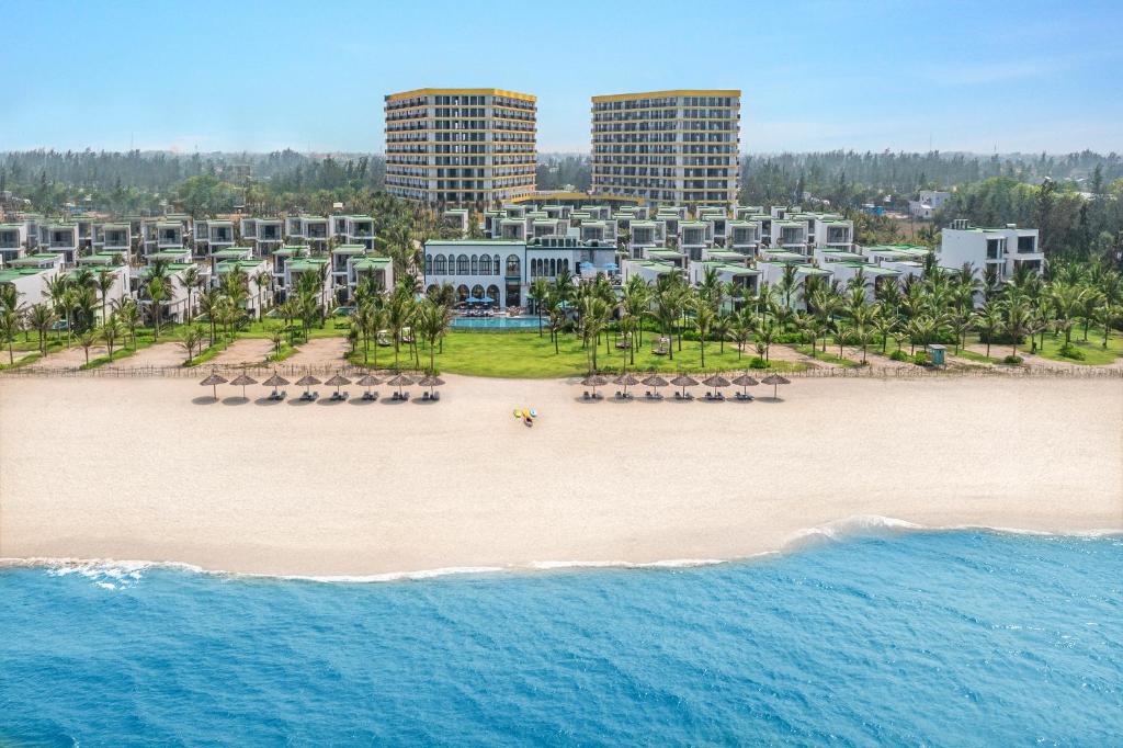 an aerial view of a resort on the beach at Hoi An Royal Beachfront Resort & Villas in Dien Ban