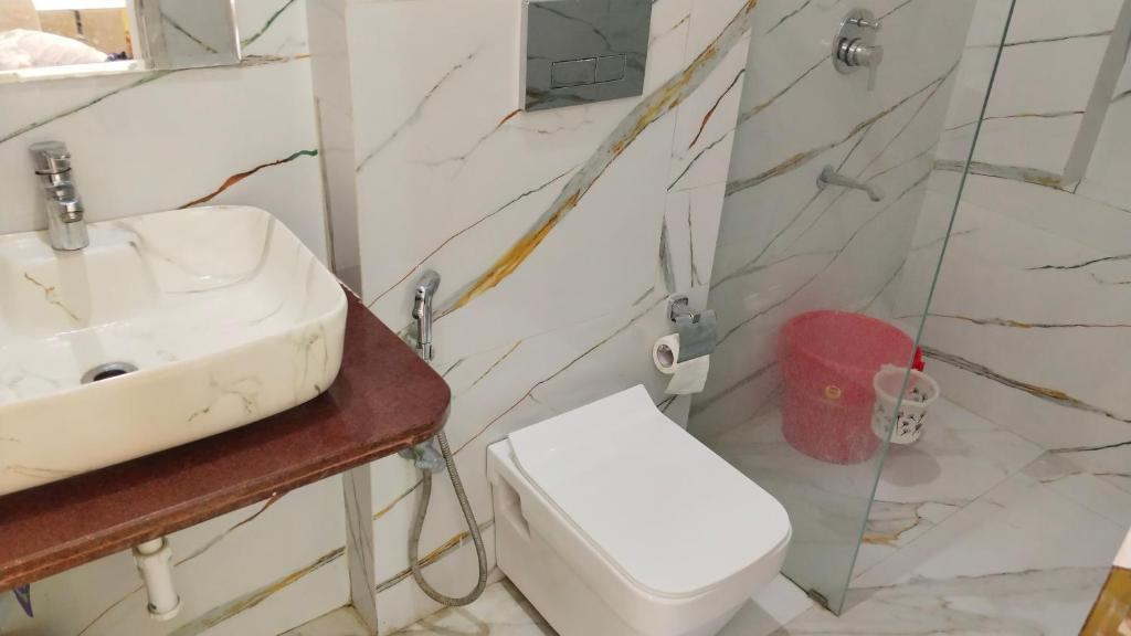 Koupelna v ubytování Gokul Niwas Udaipur Home Stay