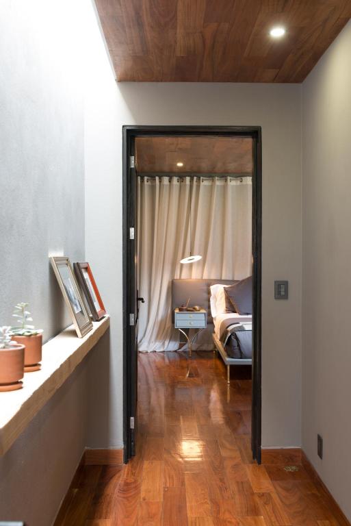 Postel nebo postele na pokoji v ubytování Dos Casas Hotel & Spa