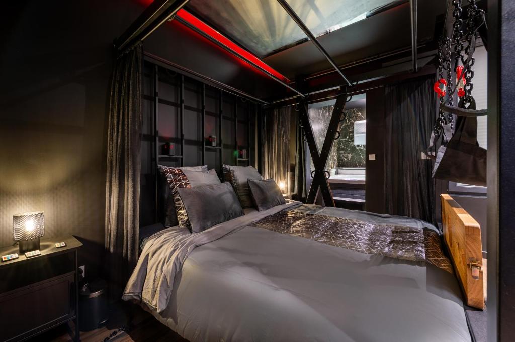 Postel nebo postele na pokoji v ubytování Le Fantasme