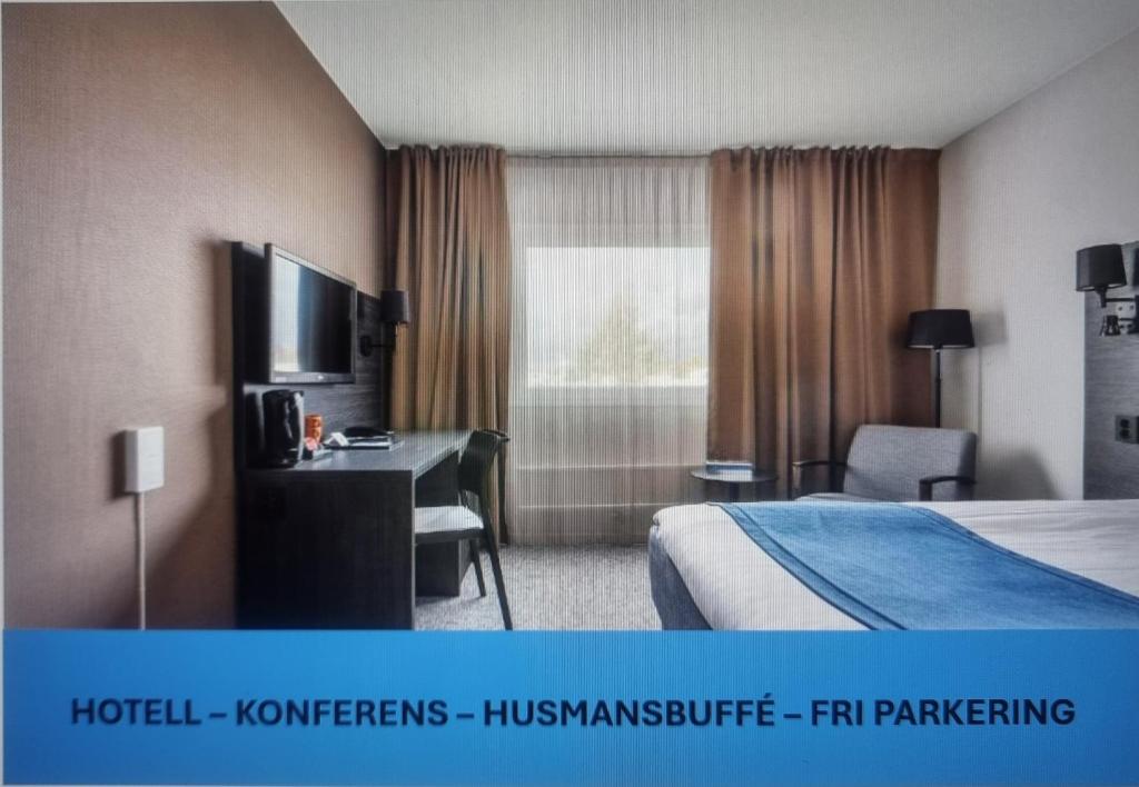 a hotel room with a bed and a desk and a television at Best Western Hotel Scheele in Köping