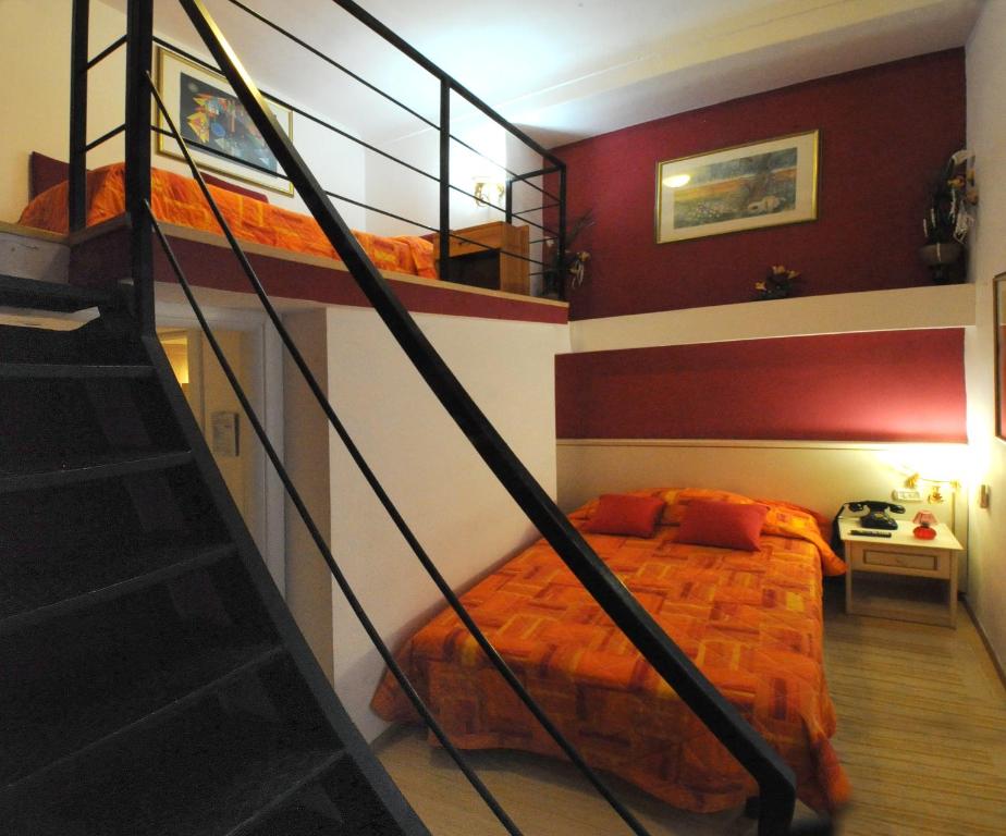 Postel nebo postele na pokoji v ubytování Hotel Alexander & Spa