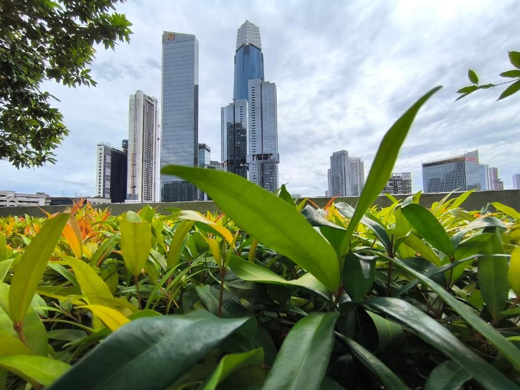 a view of a city skyline with tall buildings at Sky View Agile Residence Bukit Bintang KL in Kuala Lumpur