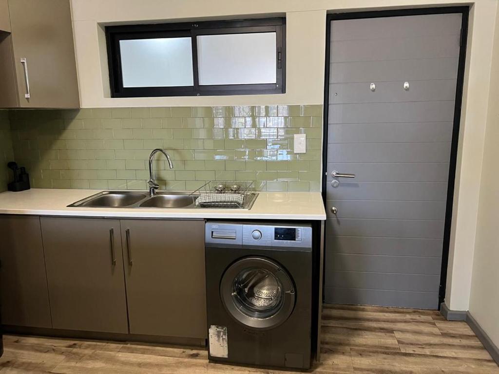 Een keuken of kitchenette bij Le grand hideout