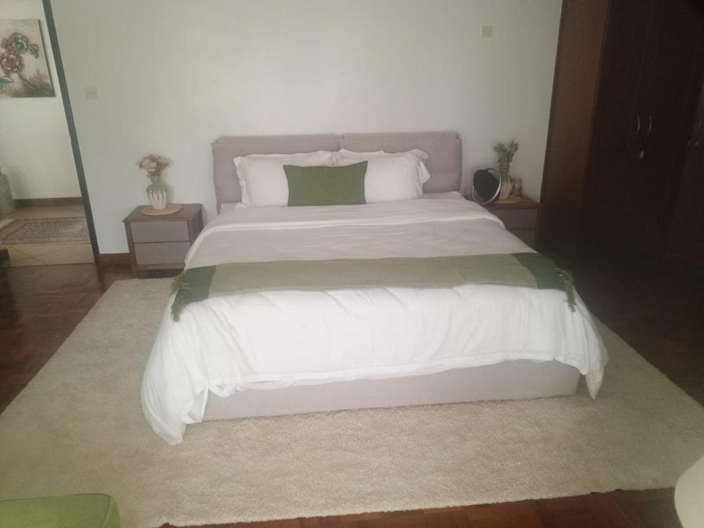 Postel nebo postele na pokoji v ubytování westsides park apartments