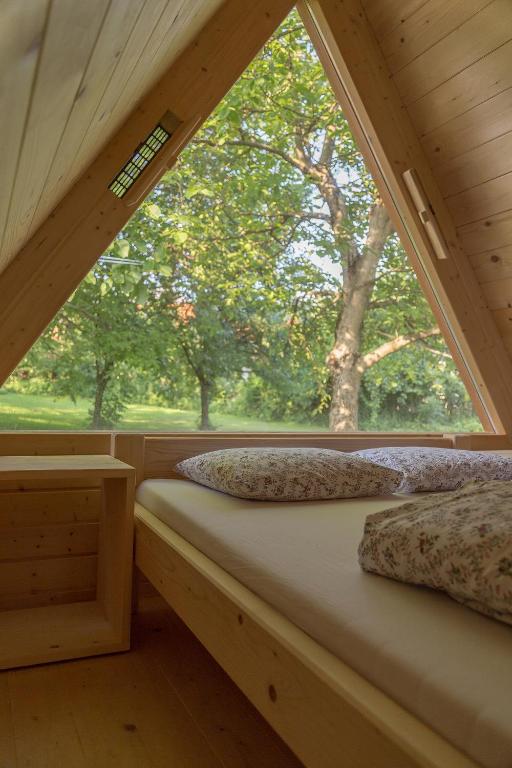 Postel nebo postele na pokoji v ubytování Glamping Bizjak