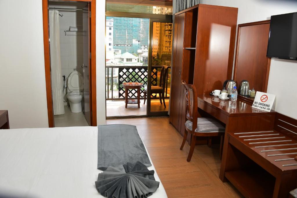 Katil atau katil-katil dalam bilik di Sun View Hotel