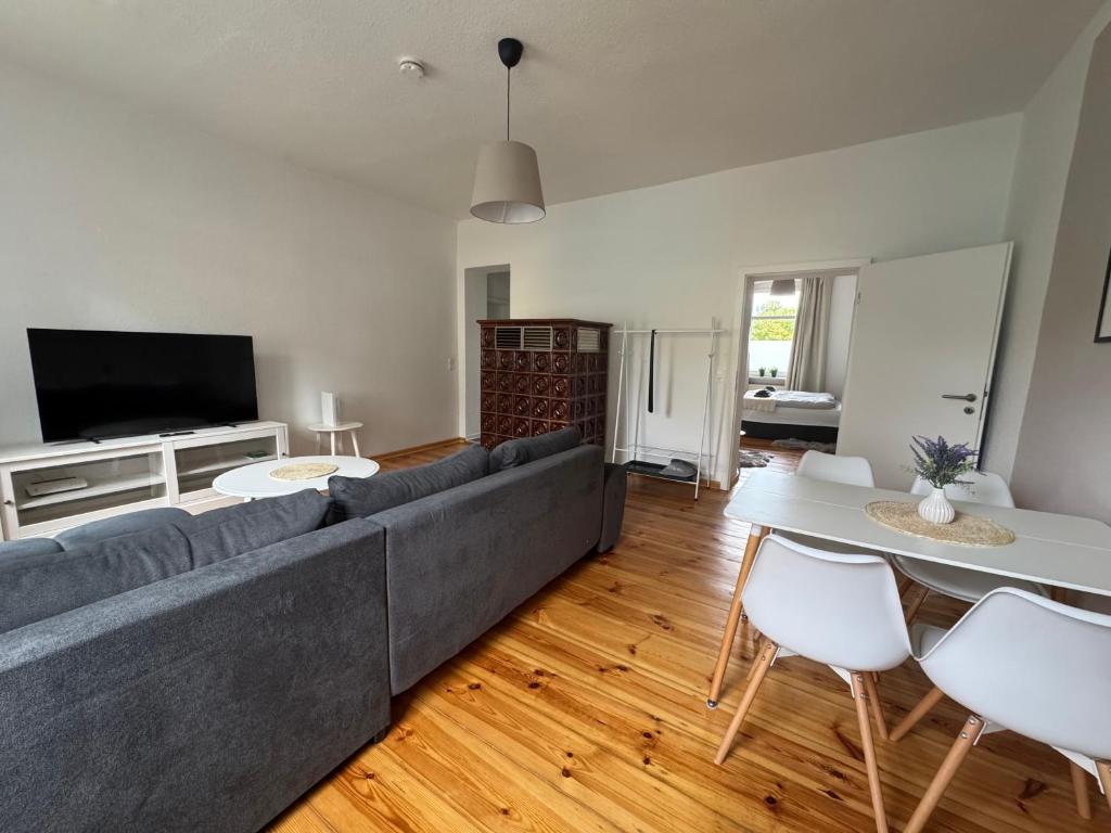 TV/trung tâm giải trí tại Family & Friends Apartment