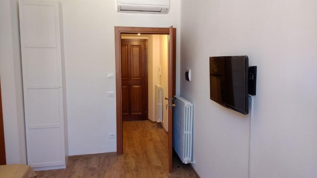 TV a/nebo společenská místnost v ubytování Camere Calocci