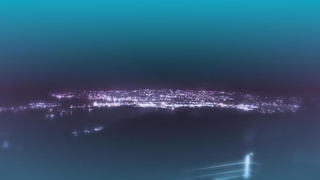 an aerial view of a city at night at Bayview Luxury Retreats in Montego Bay