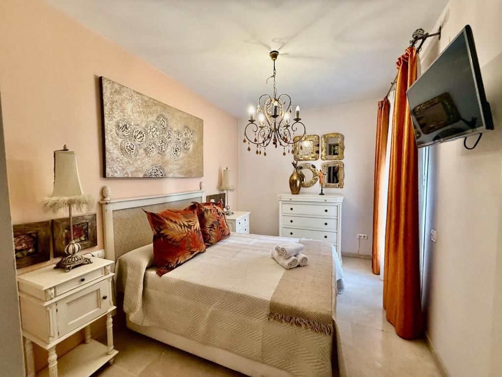 En eller flere senge i et værelse på Sonia Home