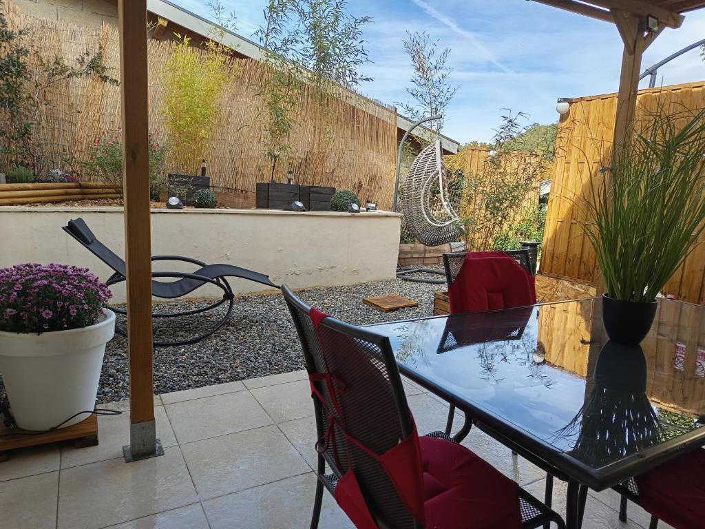 Patio nebo venkovní prostory v ubytování Résidence des 4 saison