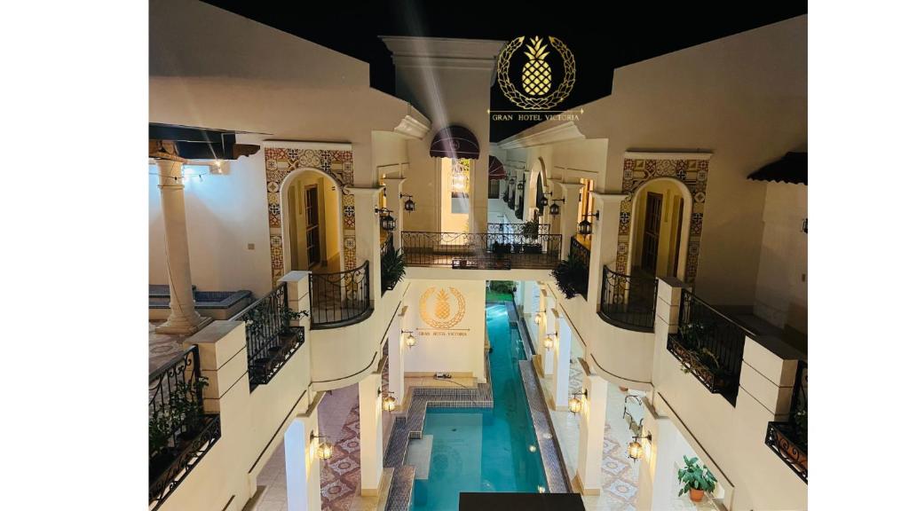 an overhead view of a swimming pool in a building at GRAN HOTEL VICTORIA in Rivas