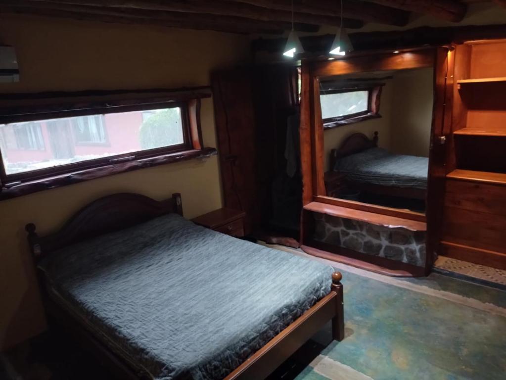 Postel nebo postele na pokoji v ubytování Rusticas