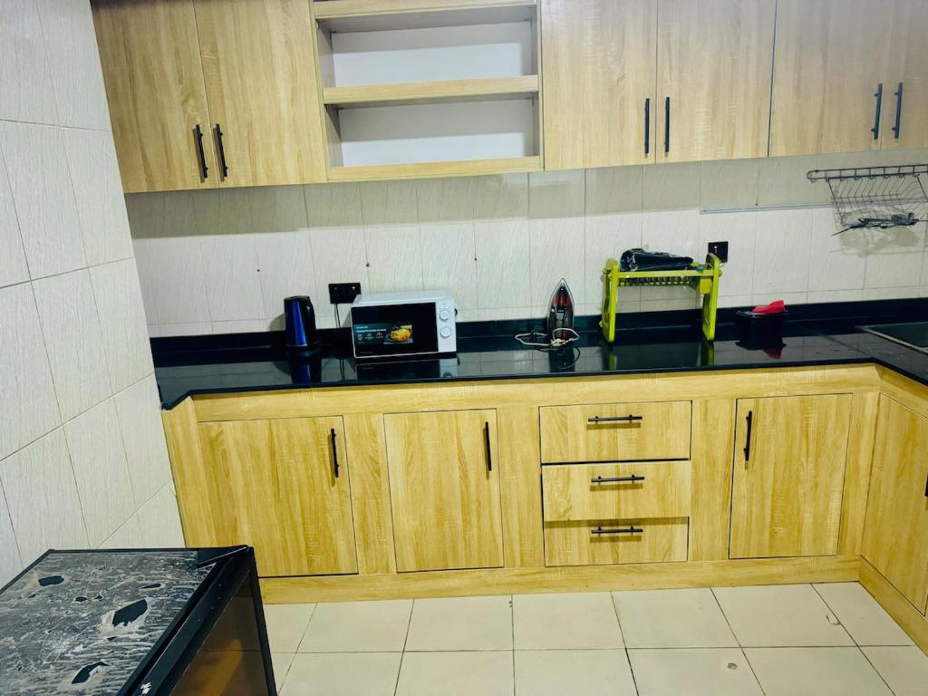 Kuchyň nebo kuchyňský kout v ubytování Marina Serviced Apartments - Lekki, Lagos