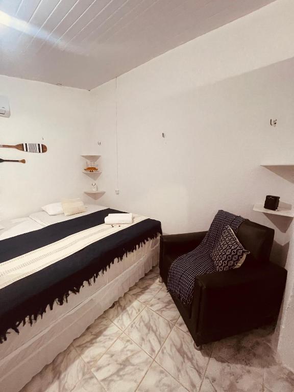 Postel nebo postele na pokoji v ubytování Suíte Privativa com conforto