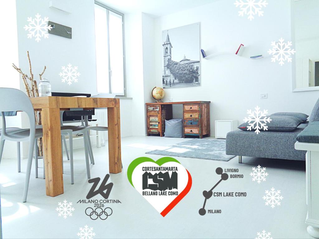 a living room with a sign in the middle at CSM Lake Como Olympic Games Milano Cortina 2026 in Bellano