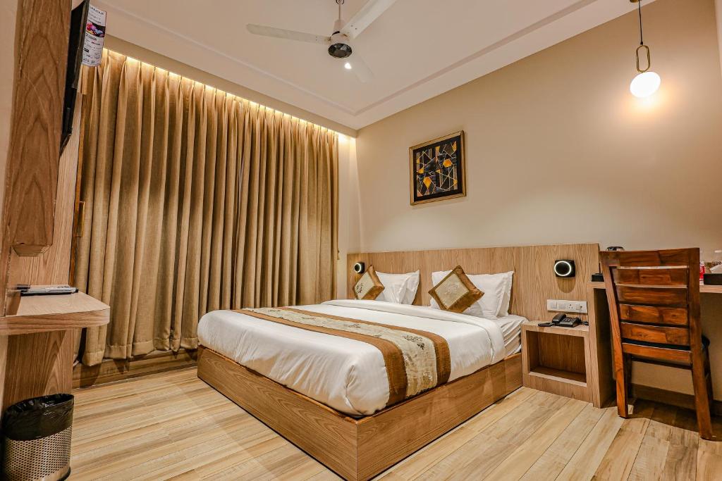 Postel nebo postele na pokoji v ubytování Hotel Alfa Suites