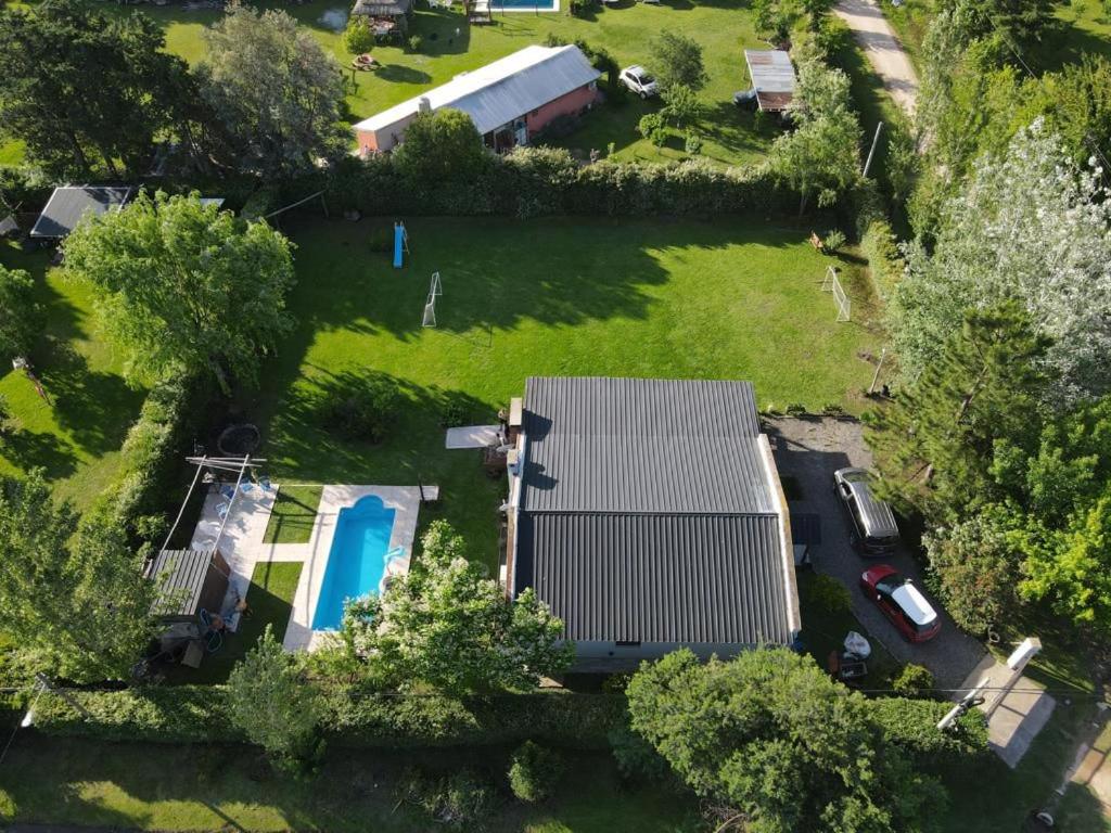 an aerial view of a house with a yard at Quinta La Berna in Etchegoyen