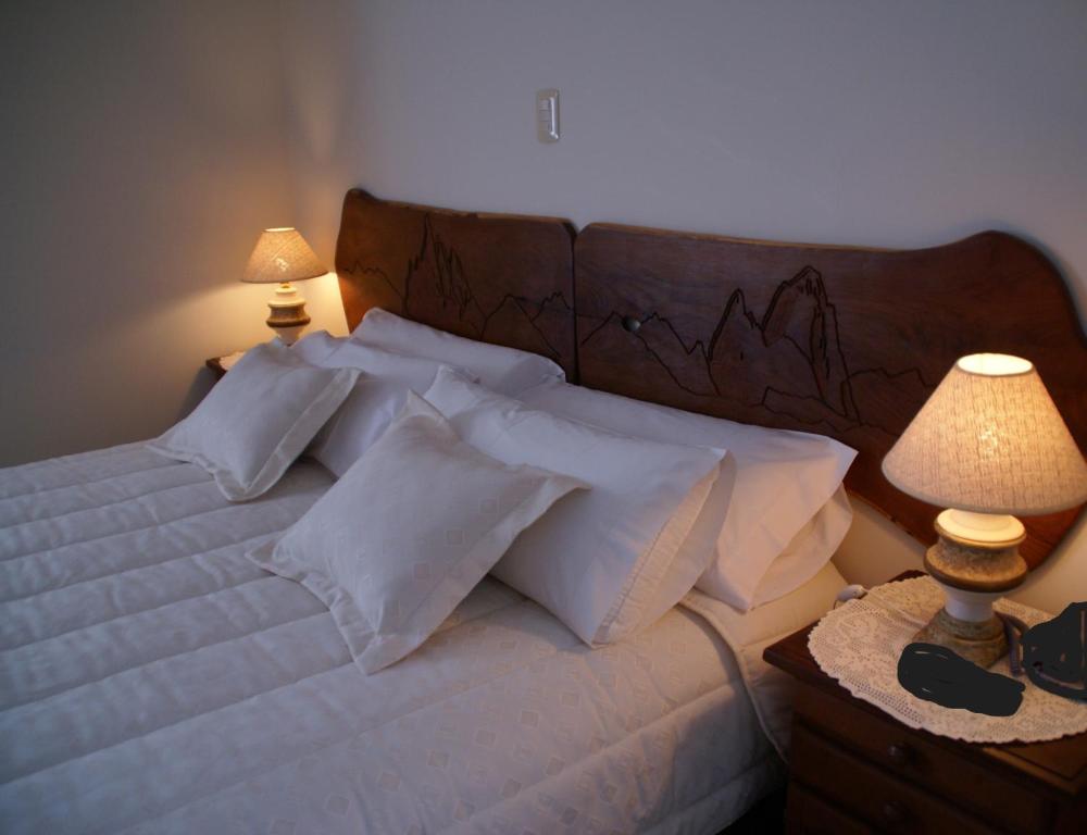 Ένα ή περισσότερα κρεβάτια σε δωμάτιο στο Hotel Las Piedras de Patagonia