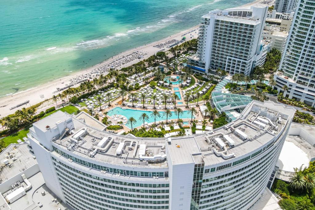 an aerial view of a hotel and the beach at Fontaine Bleau Suite - Street & Partial Ocean view in Miami Beach