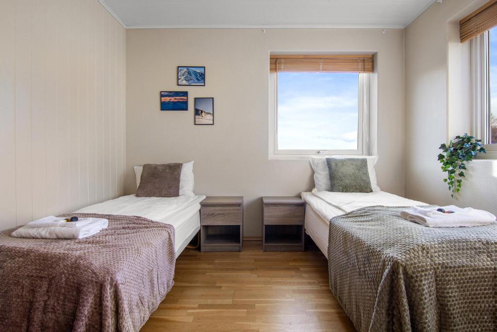 En eller flere senge i et værelse på Cozy Studio Close to City, Kitchen & Parking