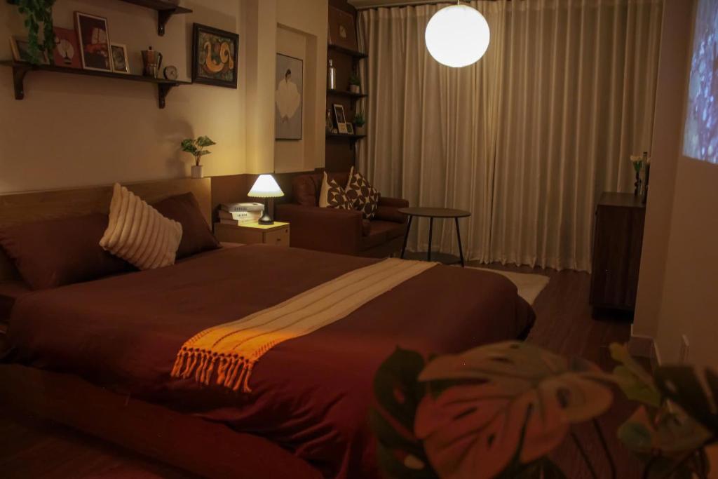 Postel nebo postele na pokoji v ubytování Yên Art Homestay