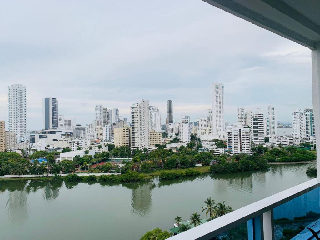 a view of a city from a balcony at apartamento 1302 in Cartagena de Indias