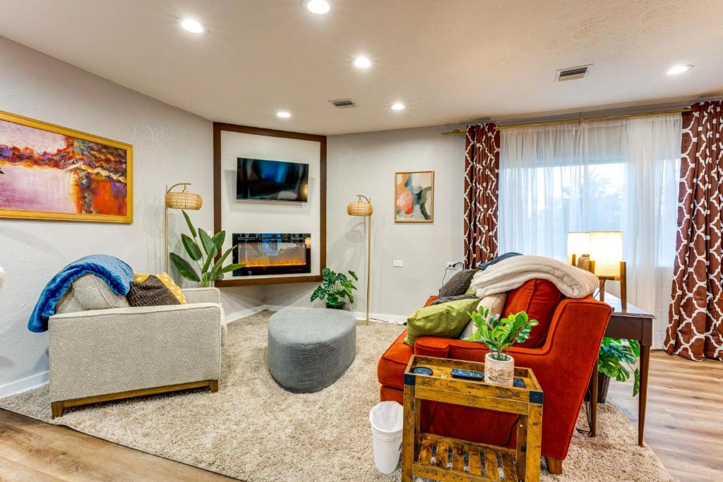 a living room with a couch and a table at Unique, Convenient Couples Apt Near Dtwn Flushing in Flushing