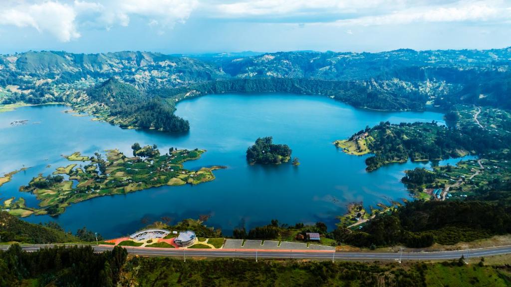 an island in the middle of a lake at Wenchi Eco-lodge in Dirē Kʼalu
