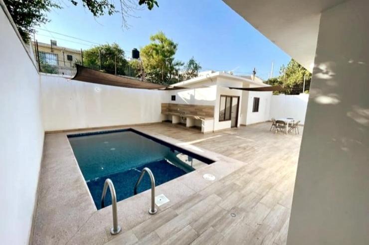 Bazén v ubytování Casa Céntrica con Alberca! nebo v jeho okolí