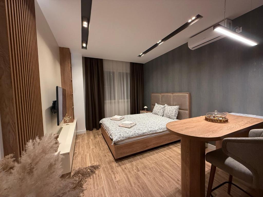Ένα ή περισσότερα κρεβάτια σε δωμάτιο στο IL PRIMO Studio Apartment