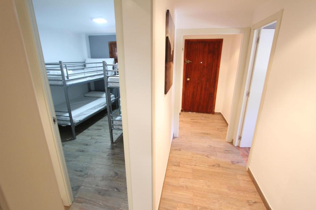 Postel nebo postele na pokoji v ubytování For a Stay Don Quijote