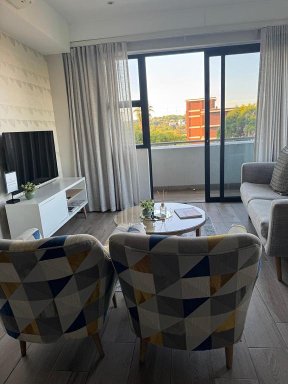 TV a/nebo společenská místnost v ubytování 214-1 Standard Room