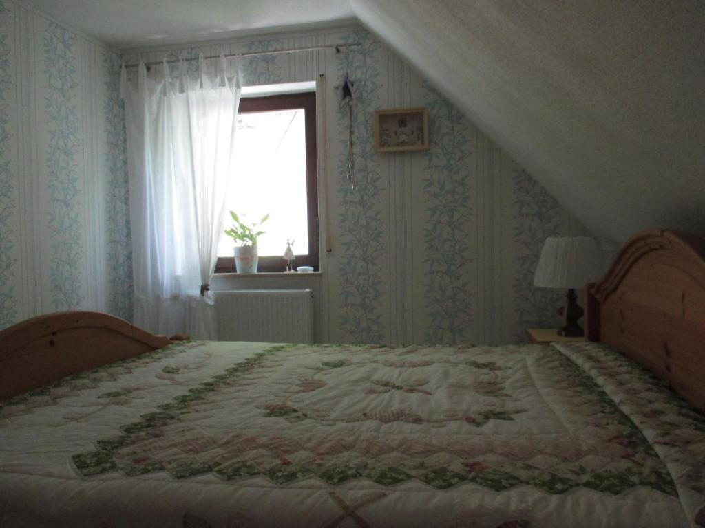 Postel nebo postele na pokoji v ubytování Apartments in Behringersmühle