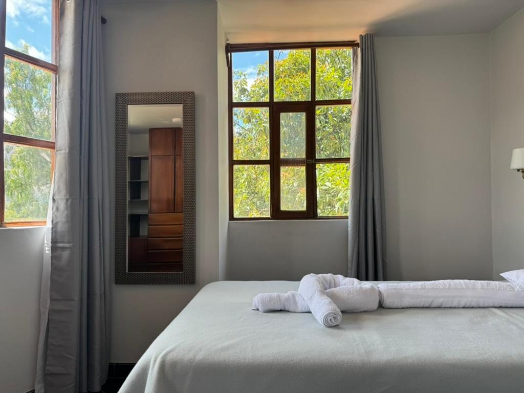 Postel nebo postele na pokoji v ubytování Shumaq Guesthouse