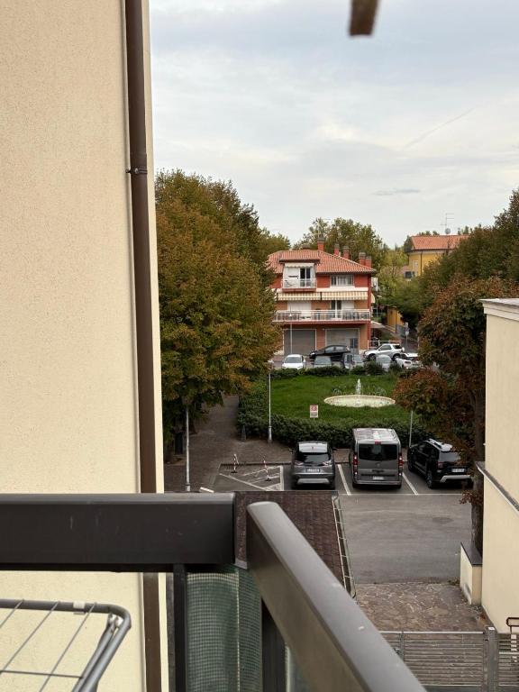 a balcony with a view of a parking lot at Bartoli 8, Viserbella di Rimini in Rimini