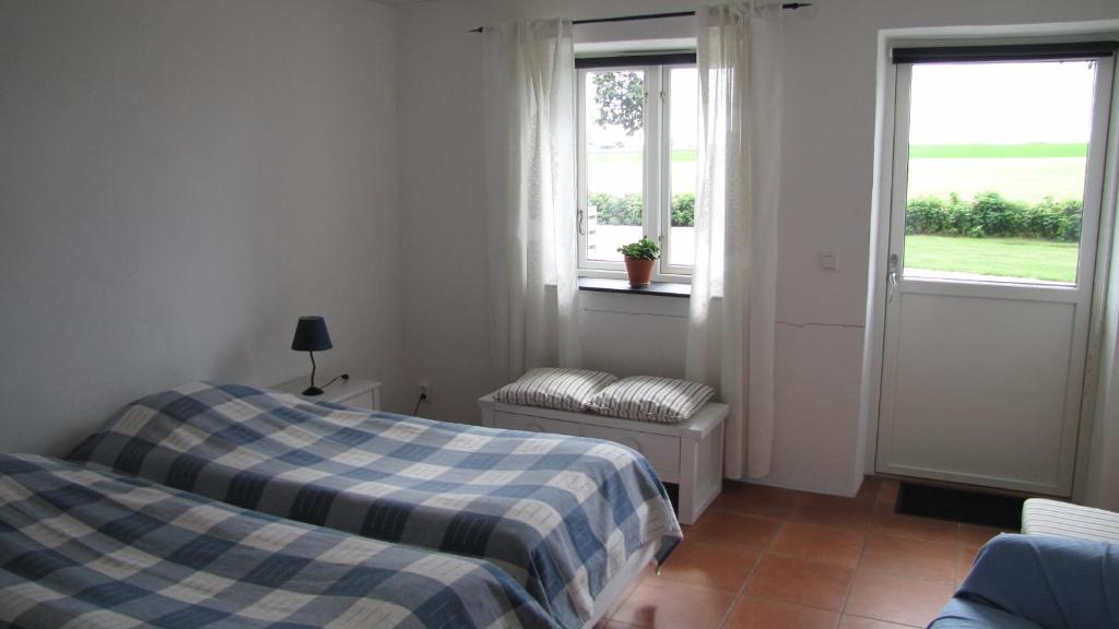 Postel nebo postele na pokoji v ubytování Skönadal B&B