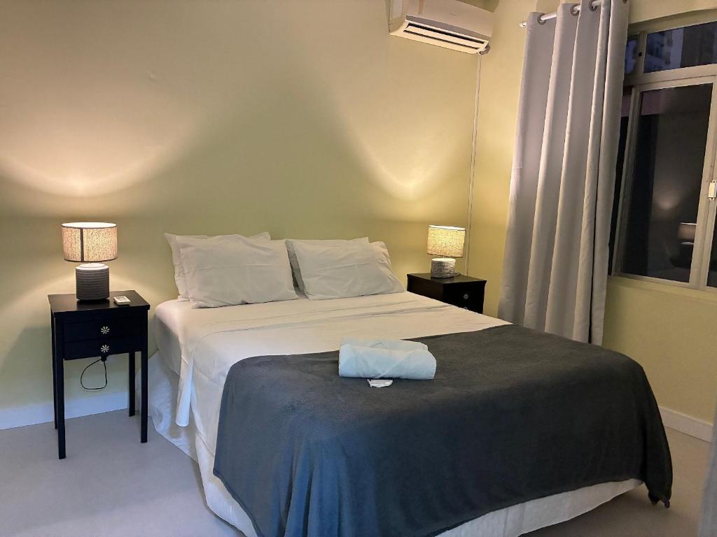 Postel nebo postele na pokoji v ubytování Aptos completos com localização privilegiada no coração de Floripa – CSNs