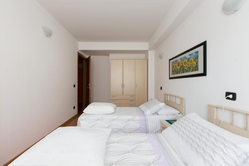 Postel nebo postele na pokoji v ubytování B&B La Corte
